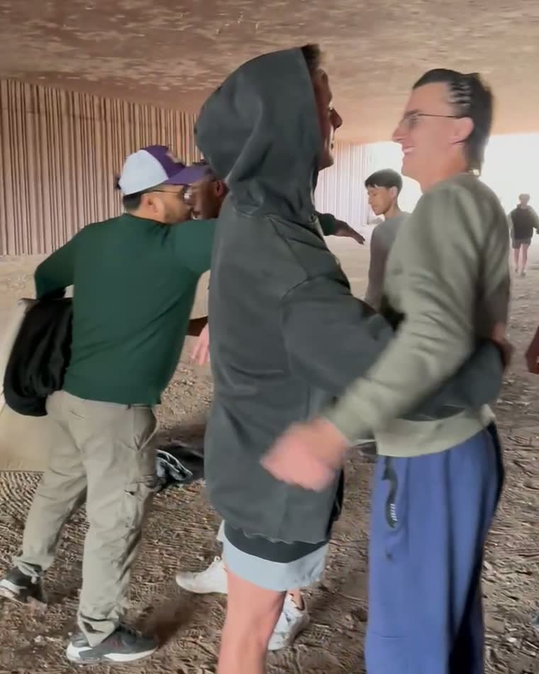 People greeting each other outdoors