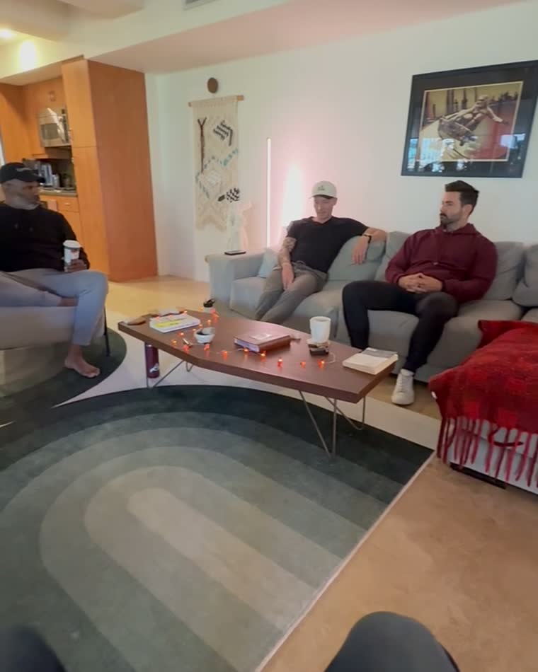 A small circle gathered in a living room
